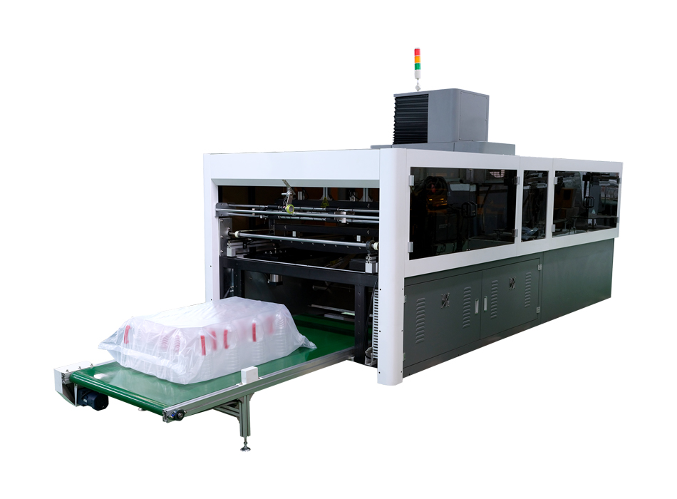 Automatic packing machine for plastic bottles